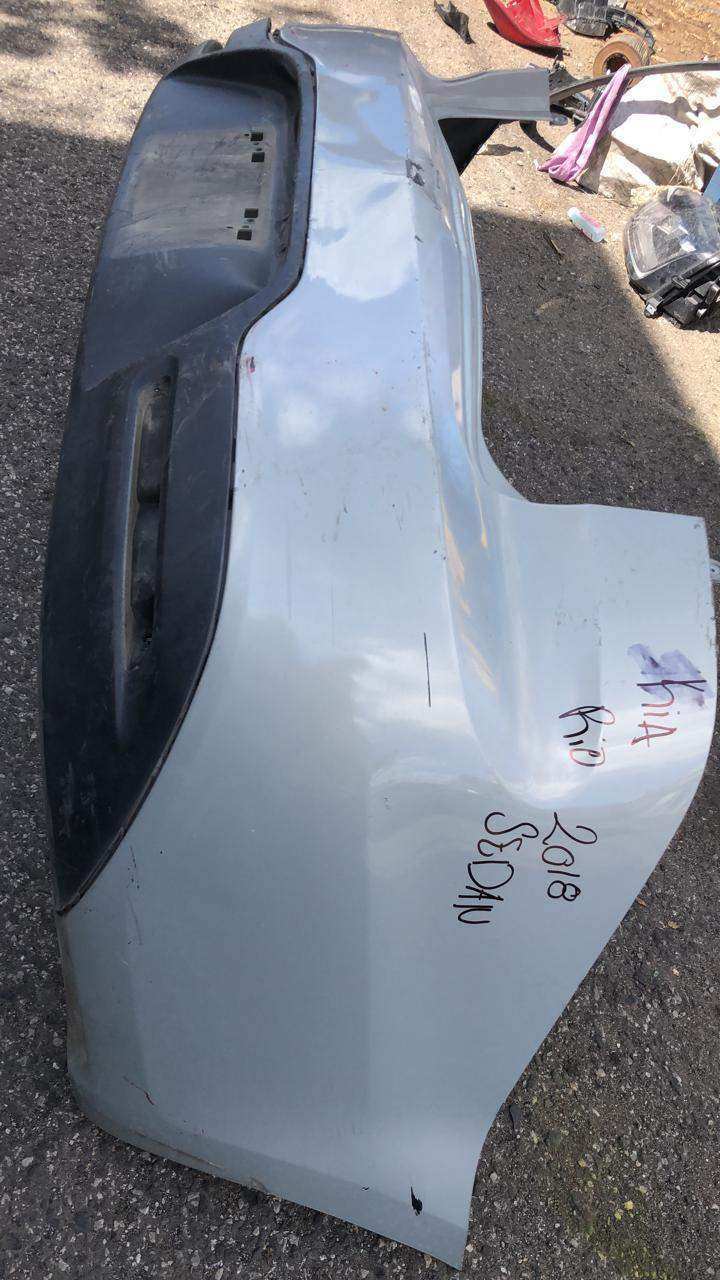 Bumper trasero Kia Rio Sedán 2012-2016 - Grupo Revisa
