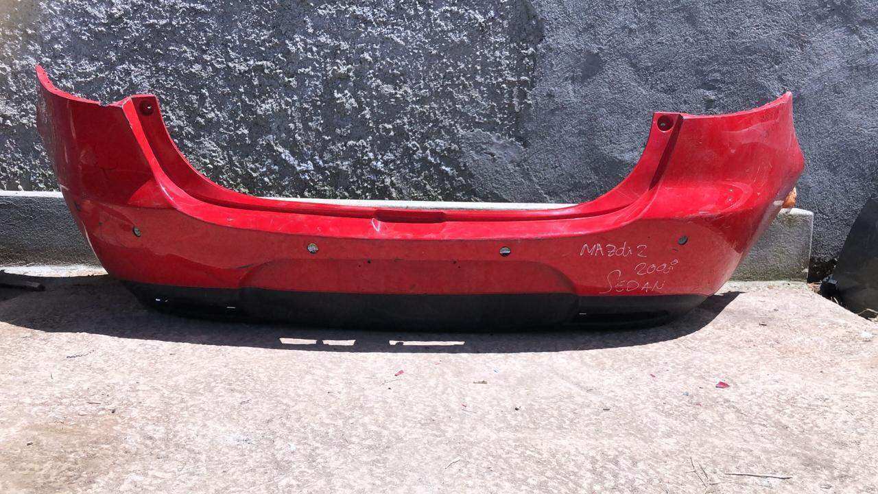Bumper trasero mazda 2 sedan 2008 2012 - Grupo Revisa