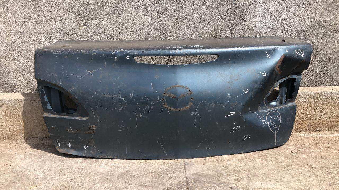 Compuerta baul mazda 3 2010 2013 sedan (BBY4-52-61XD) - Grupo Revisa