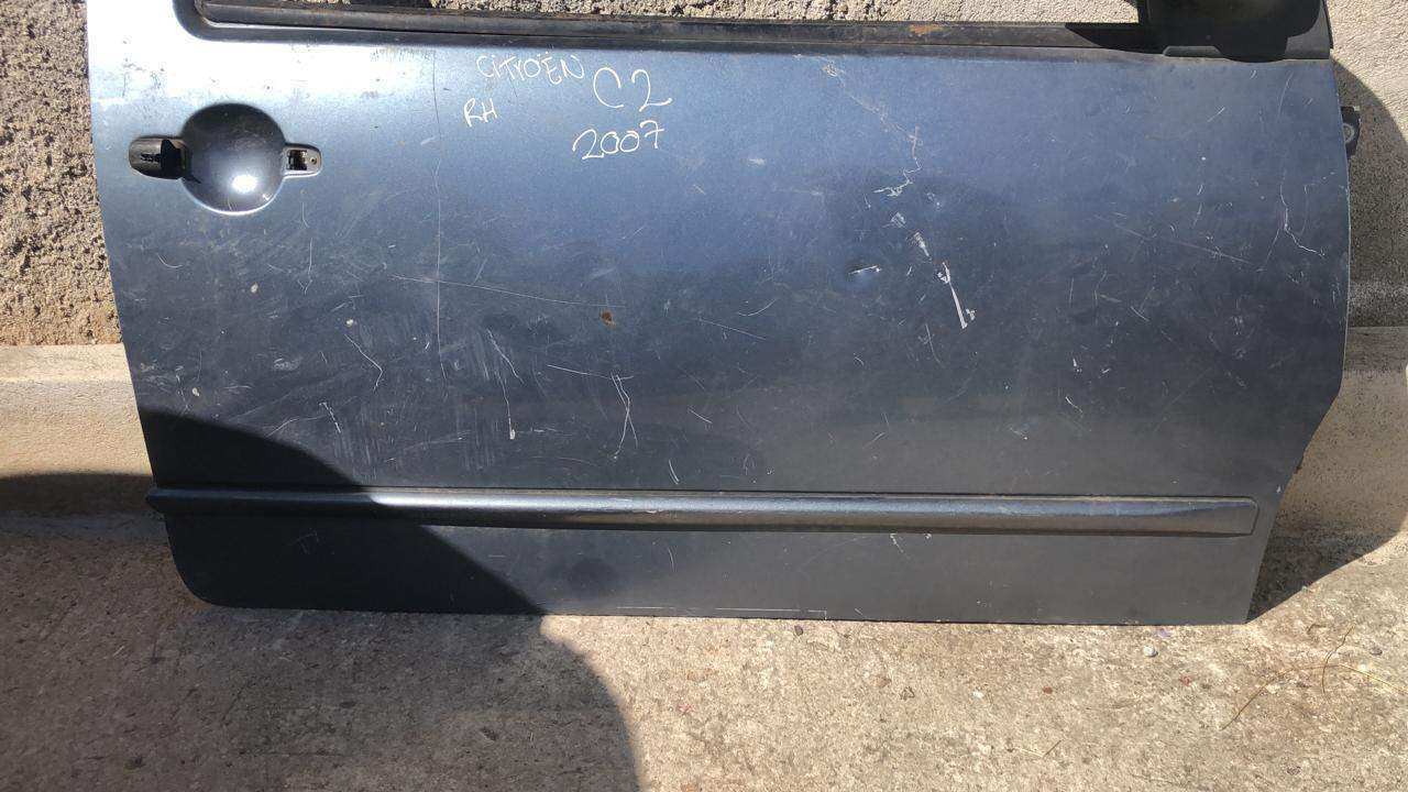 Puerta delantera derecha Citroen c2 2002 2009 (011007841101A) - Grupo Revisa