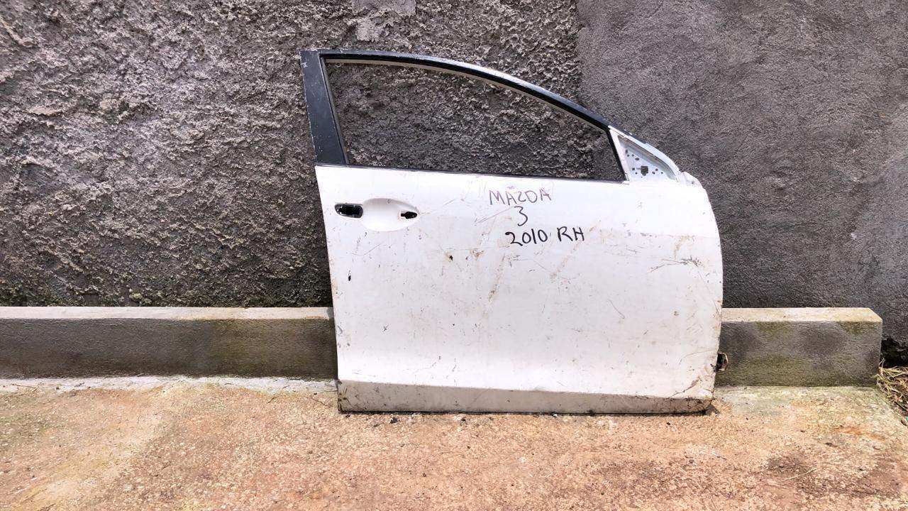 Puerta delantera derecha mazda 3 2010 2013 - Grupo Revisa