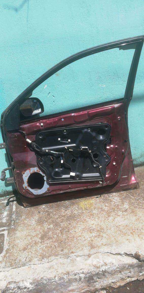 Puerta delantera derecha Nissan Murano 2002-2008 - Grupo Revisa