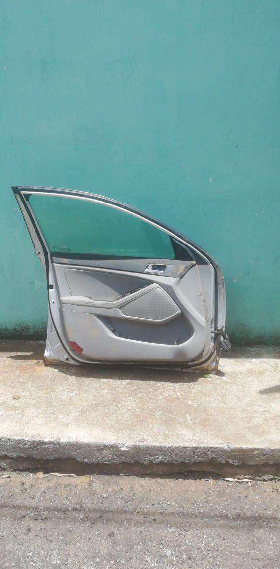 Puerta delantera izquierda Kia Optima 2012-2015 - Grupo Revisa