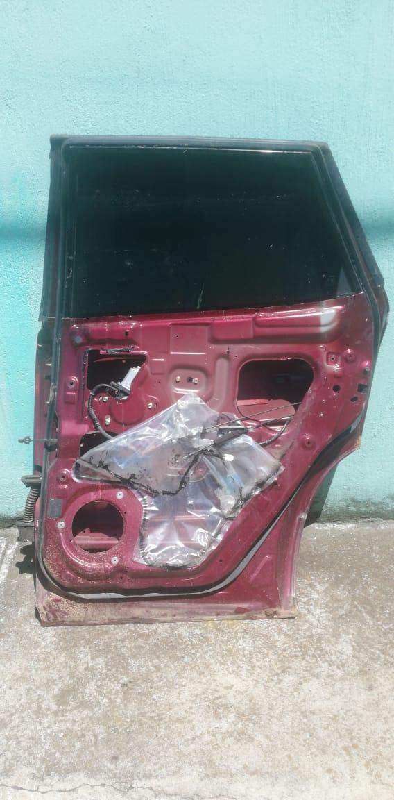Puerta trasera derecha Nissan Murano 2002-2008 - Grupo Revisa