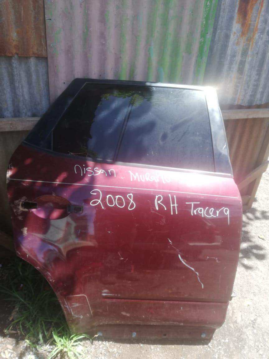 Puerta trasera derecha Nissan Murano 2002-2008 - Grupo Revisa