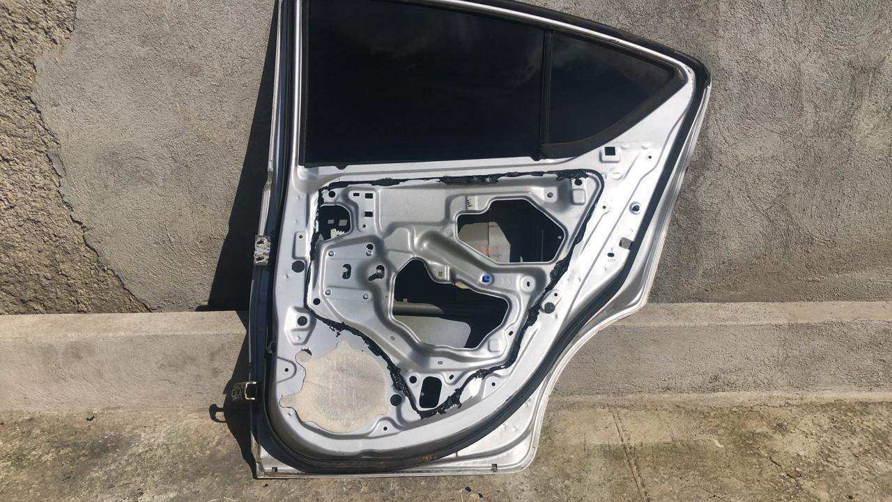 Puerta trasera derecha nissan versa sedan 2012 2019 - Grupo Revisa