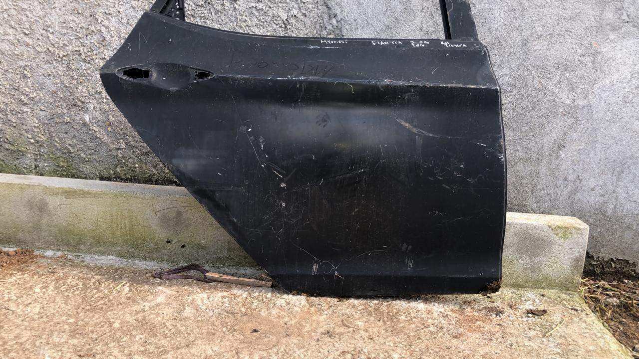 Puerta trasera derecha RH Hyundai elantra sedan 2012 2016 - Grupo Revisa