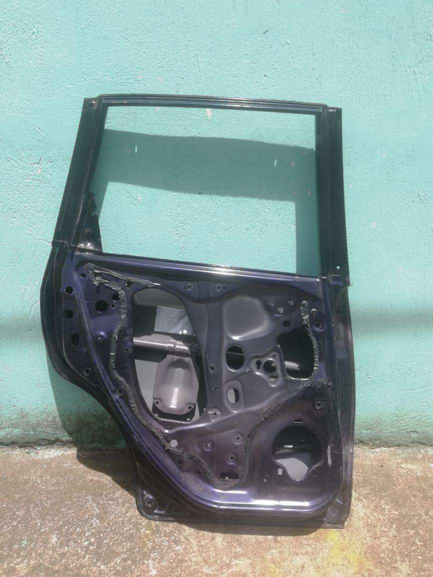 Puerta trasera izquierda honda fit 2009 2013 - Grupo Revisa