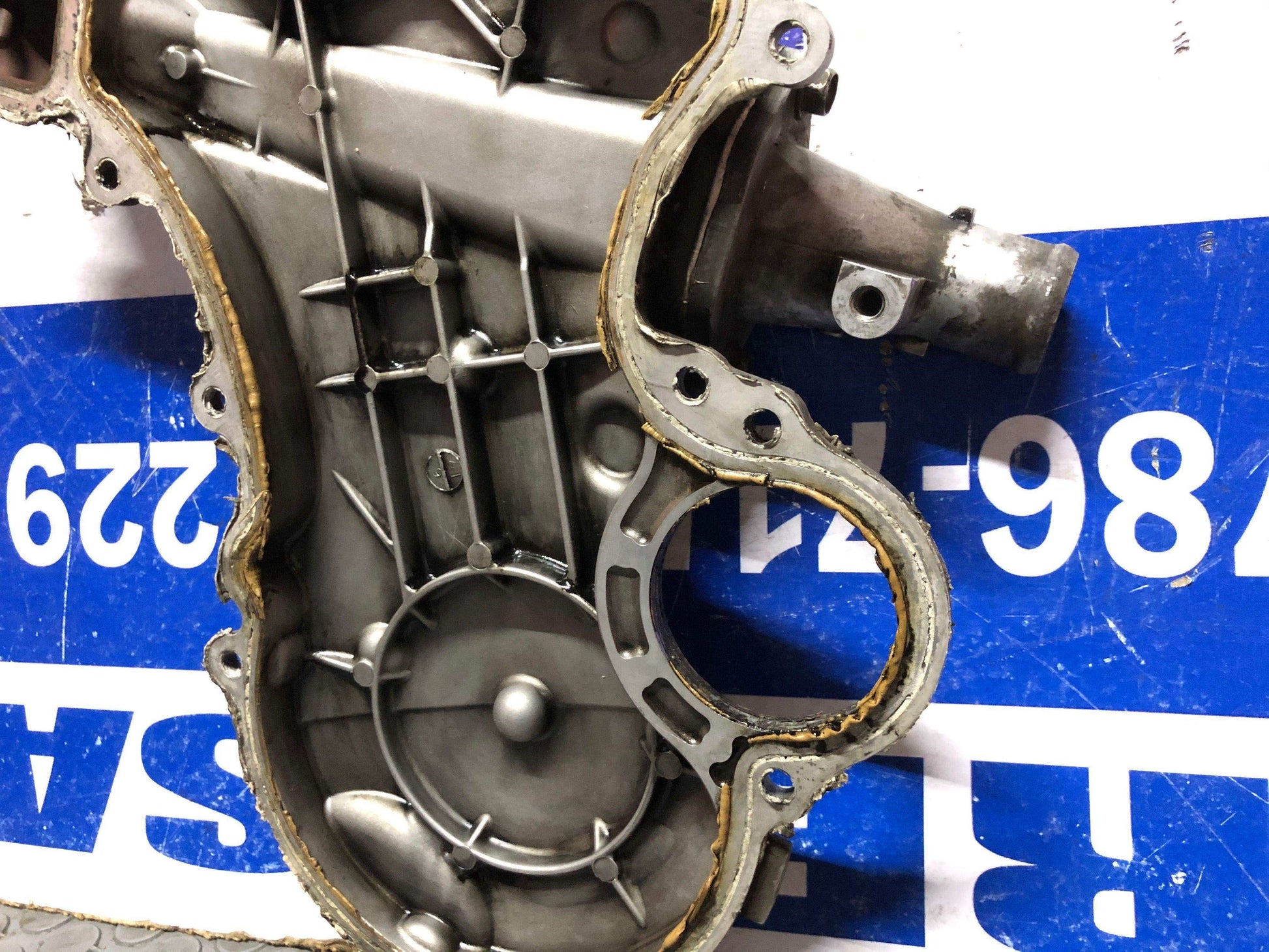 Tapa frontal de motor Nissan urvan frontier 2008 2013 (130362w203) 3.0l - Grupo Revisa