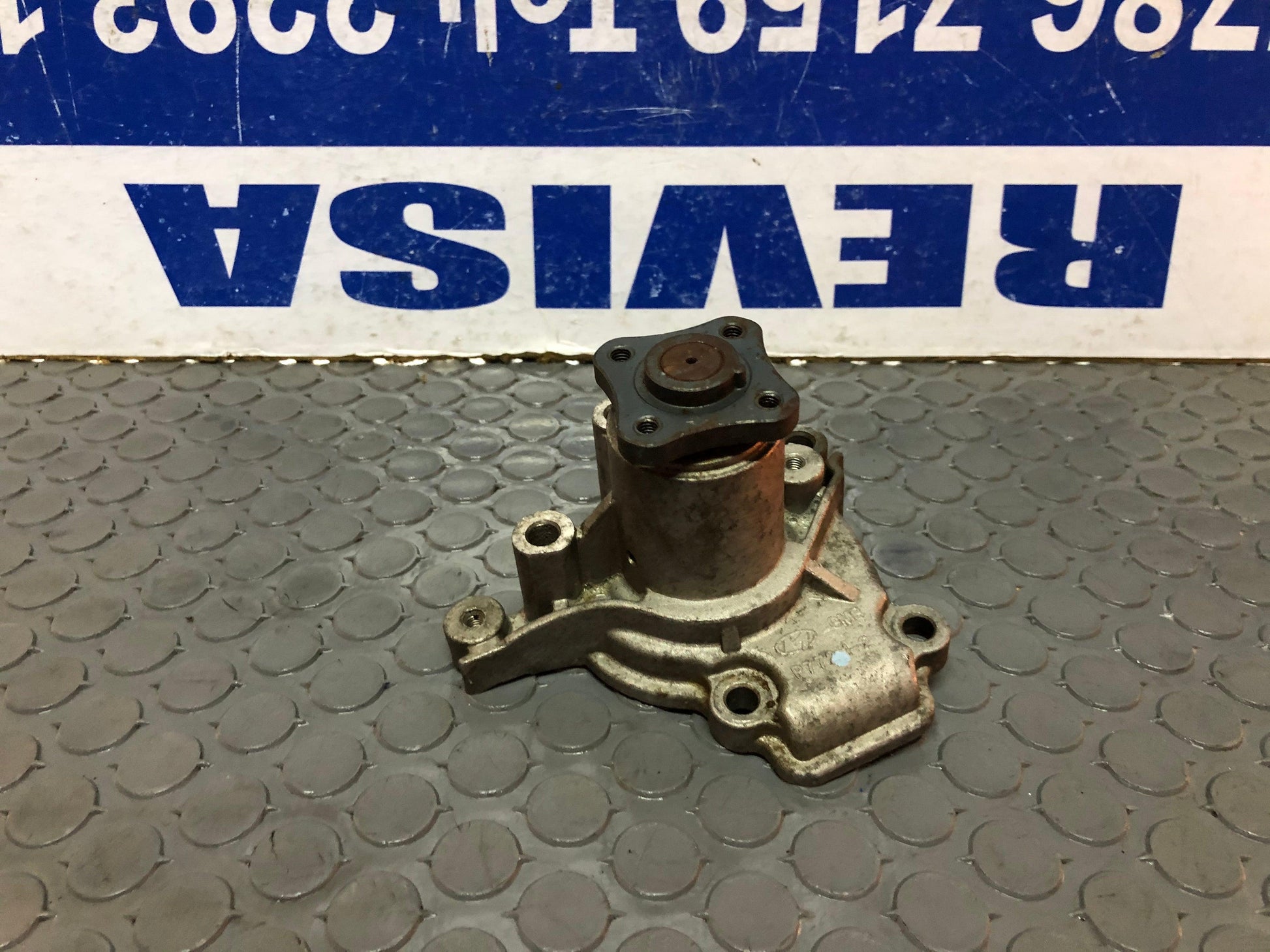 Bomba de agua Hyundai Elantra Tucson 1995 1998 1.8l (p7721-2) - Grupo Revisa 