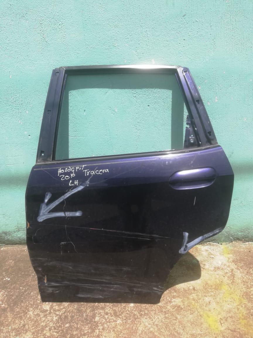 Puerta trasera izquierda honda fit 2009 2013 - Grupo Revisa 